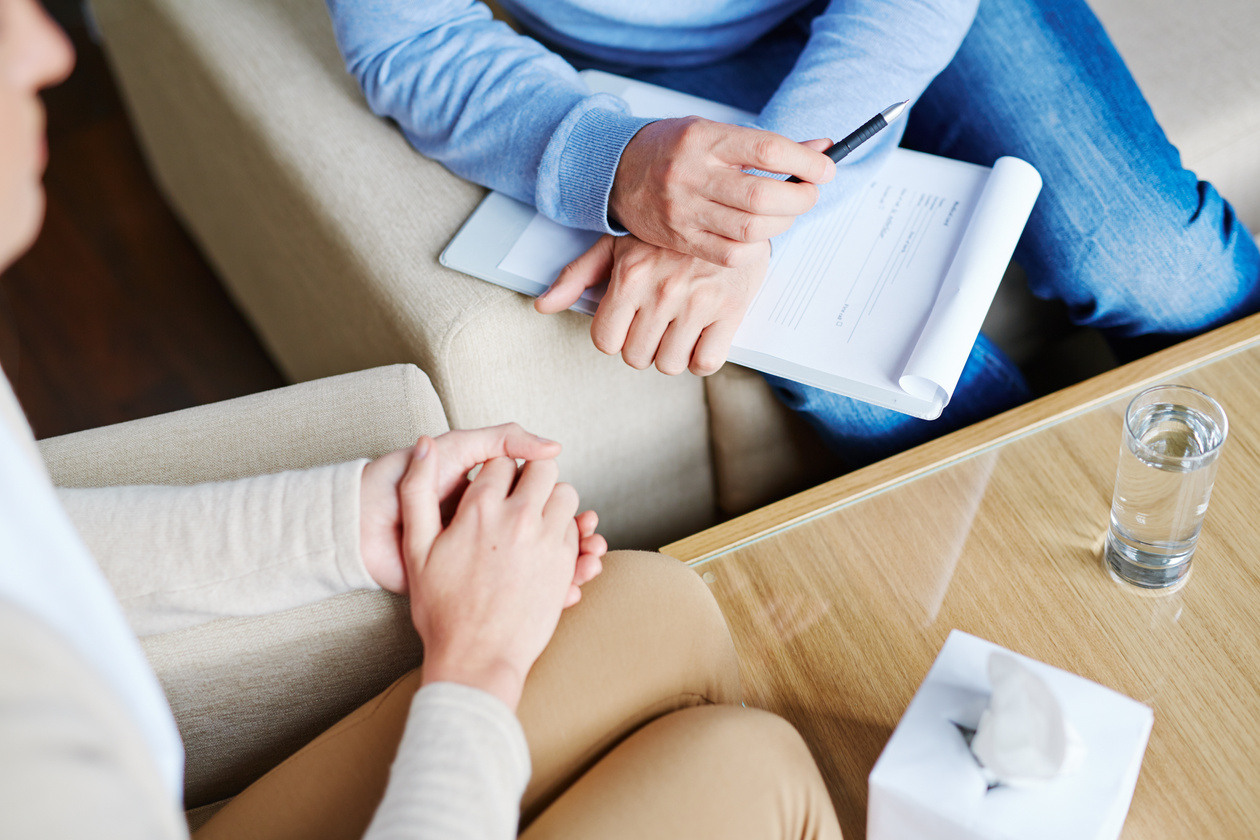 Psychologist listening to patient